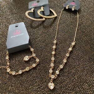 Brand new hearts, bracelet, and earrings by paparazzi
